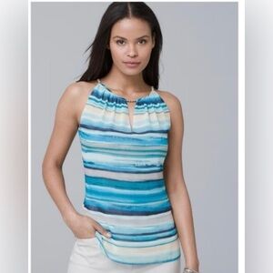 Beautiful blue mirage sleeveless top with tags.